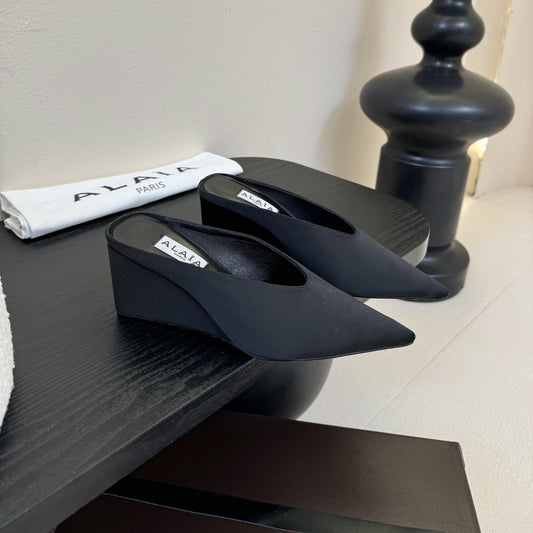 ALAIA HIGH MULES 25S IN BLACK SATIN