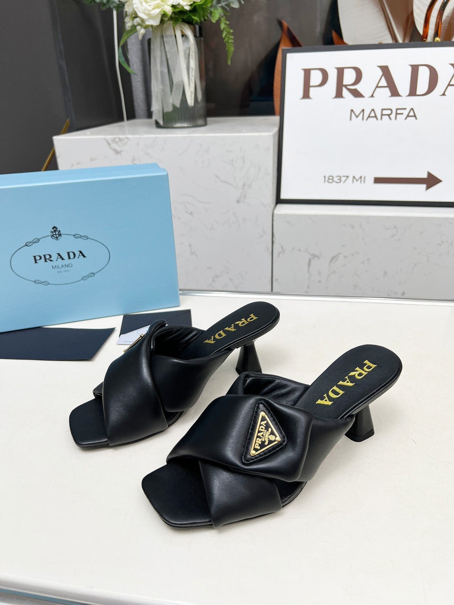 PRA CROSS MULE HEELS IN BLACK CALFSKIN WITH PADDED STRAPS