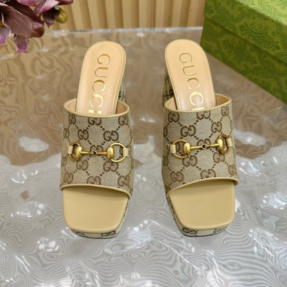 HORSEBIT SLIDE SANDAL IN ECRU BEIGE MONOGRAM CANVAS AND SHEEPSKIN LINING