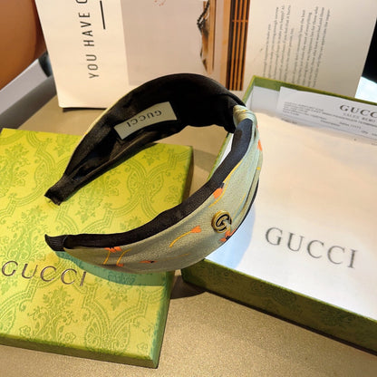 HAIRBAND WITH FLOWER PRINT IN MOSS GREEN SILK 398865