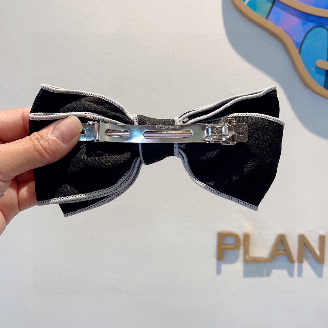 BOW HAIRPIN IN BLACK AND WHITE TRIM COTTON 406022