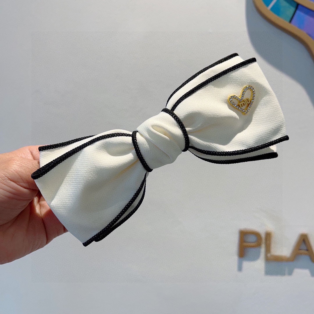 BOW HAIRPIN IN WHITE AND BLACK TRIM COTTON 406023