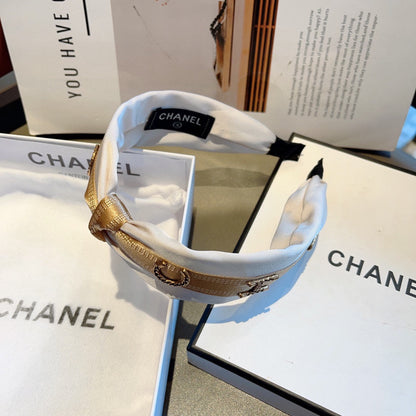 WHITE SILK HAIRBAND WITH GOLD LOGO 412440