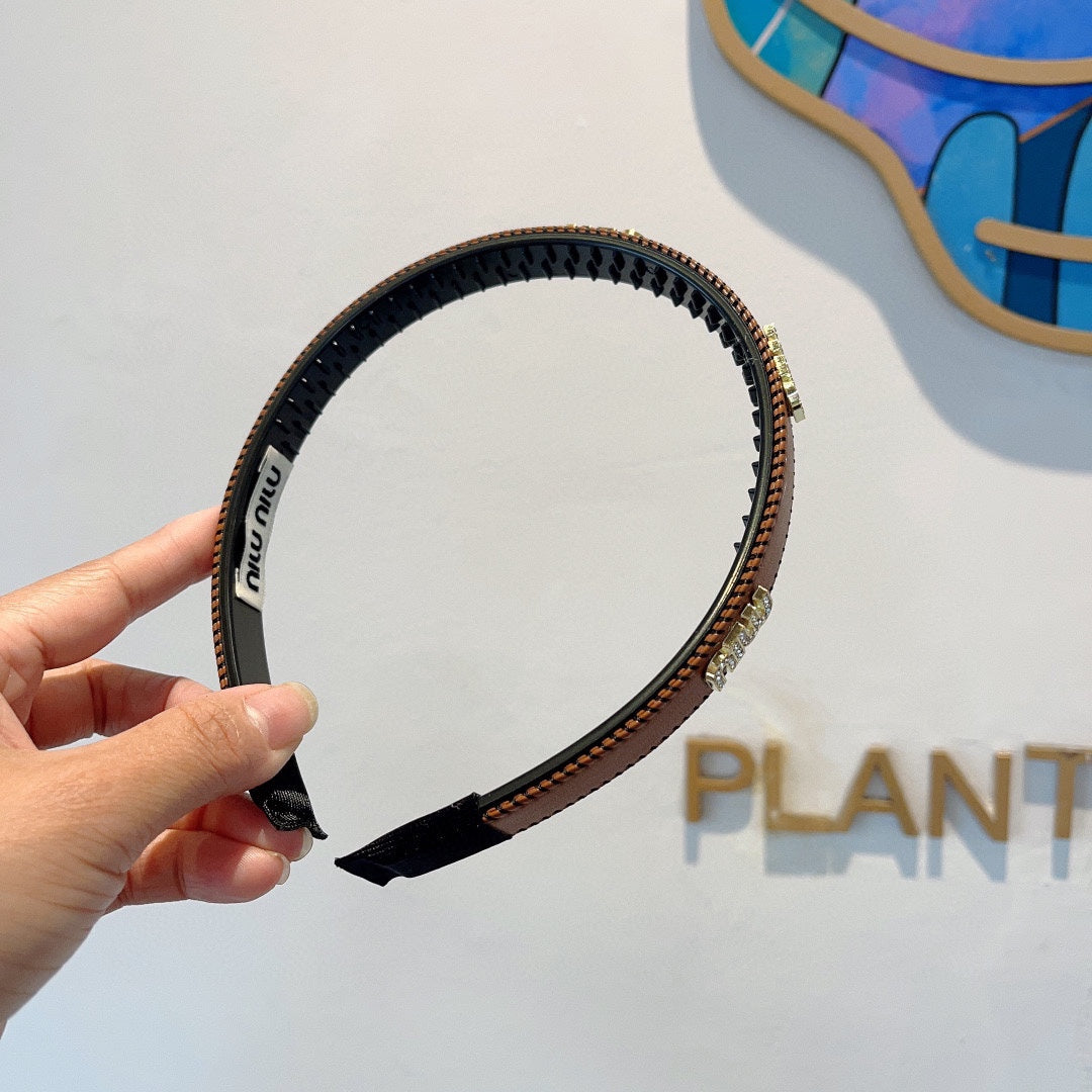 HEAD BAND IN BURNT ORANGE LAMBSKIN AND RESIN 417296