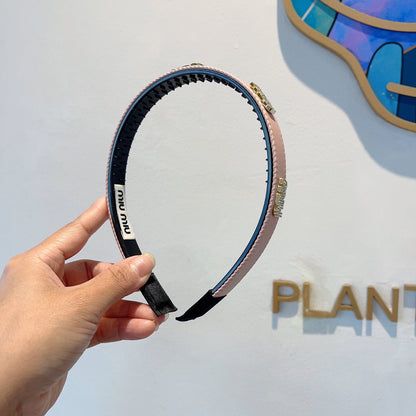 HEAD BAND IN LIGHT PINK LAMBSKIN AND RESIN 417297