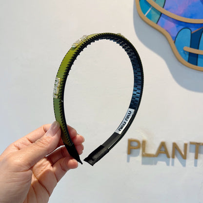 HEAD BAND IN OLIVE GREEN LAMBSKIN AND RESIN 417298