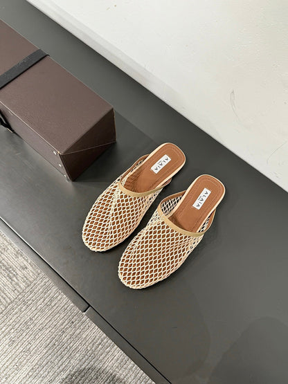 ALAIA FLAT MULES IN BEIGE MESH FISHNET