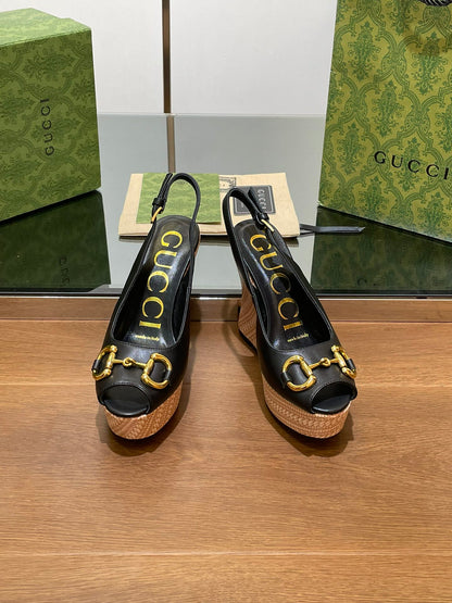 GG WEDGE PLATFORM IN BLACK CALFSKIN WITH GOLD HARDWARE