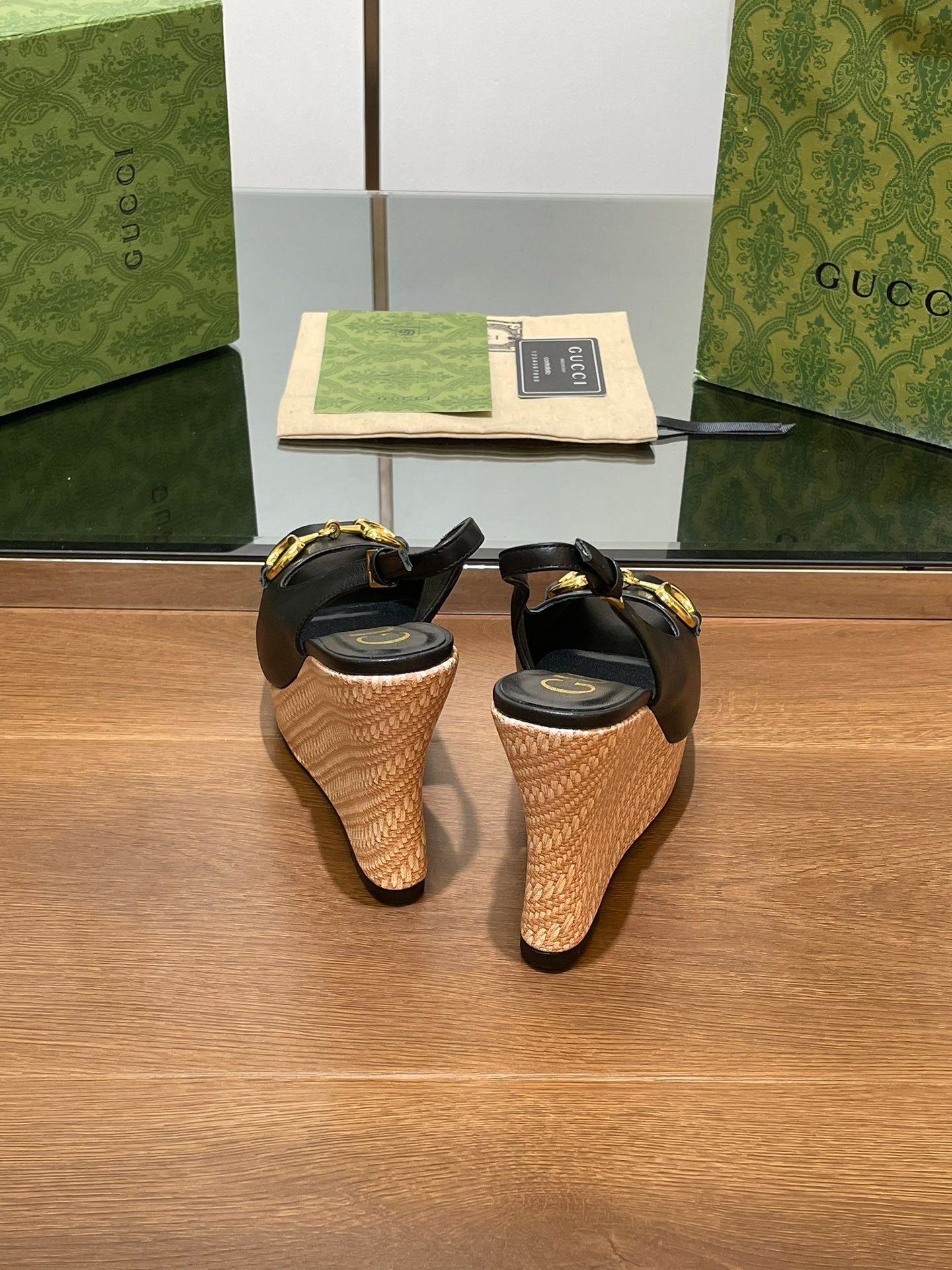 GG WEDGE PLATFORM IN BLACK CALFSKIN WITH GOLD HARDWARE