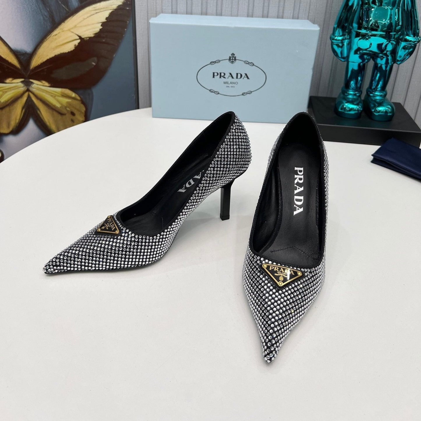 TRIANGLE LOGO HIGH-HEEL PUMPS IN BLACK SATIN WITH WHITE CRYSTALS