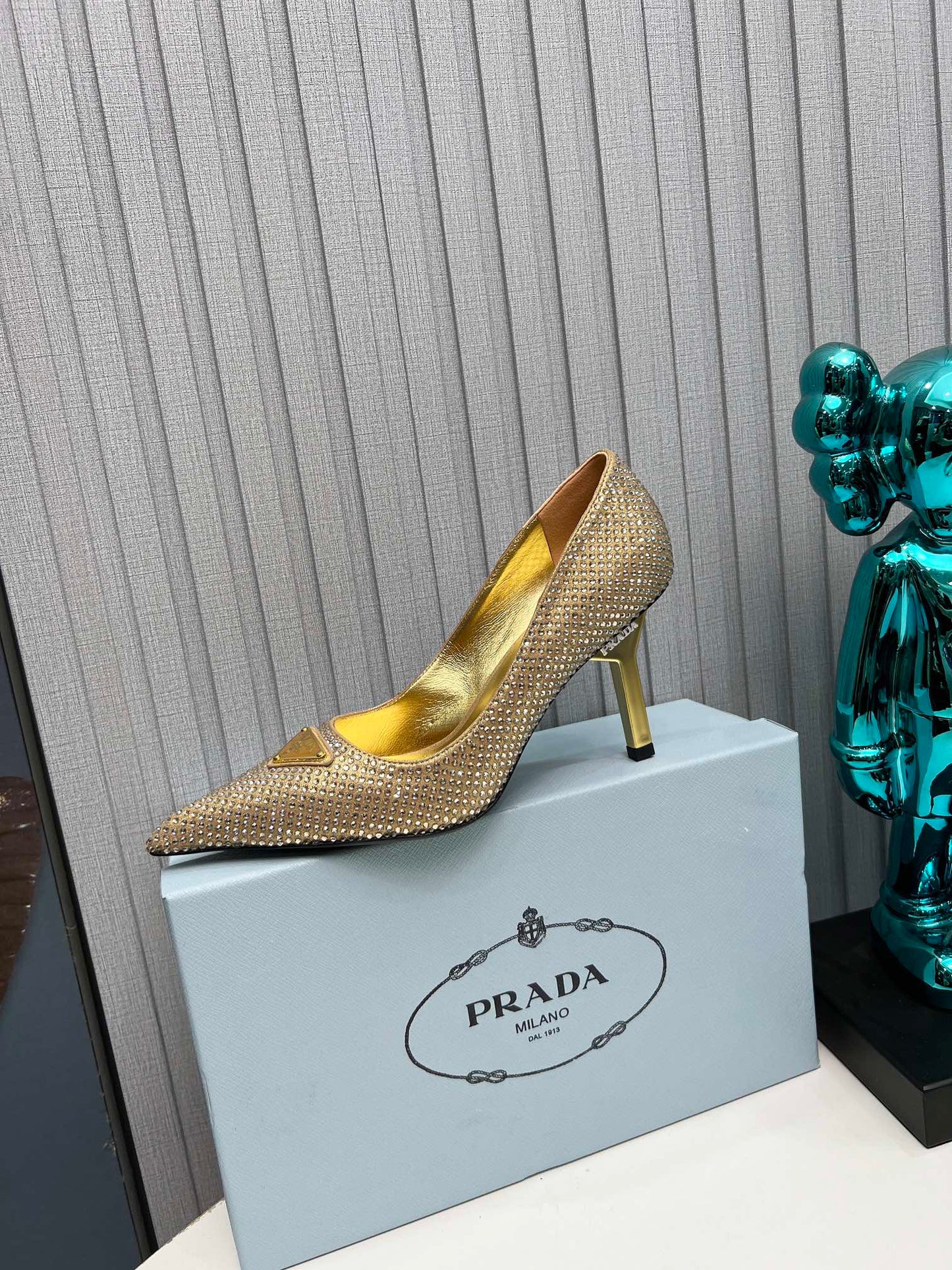 CRYSTAL HIGH-HEEL PUMPS IN GOLD SATIN WITH TRIANGLE LOGO