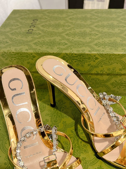 STRAPPY SANDAL WITH RHINESTONE CHAIN IN GOLD PATENT LEATHER