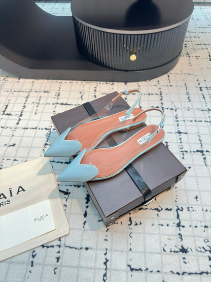 ALAIA FLAT SLINGBACK IN LIGHT BLUE PATENT CALFSKIN AND FILM