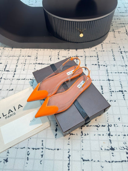 ALAIA FLAT SLINGBACK IN TIGER ORANGE PATENT CALFSKIN AND FILM