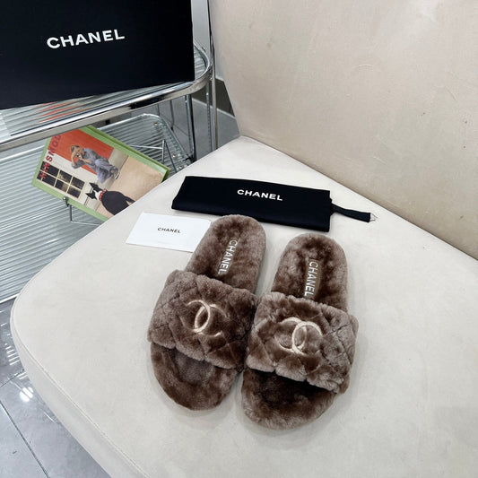 CHANEL 25S FUR SLIPPERS WITH EXPOSED-STITCH STRAPS IN DARK BROWN