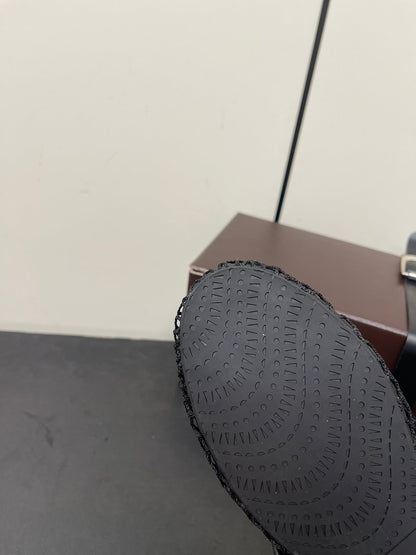 ALAIA BALLET FLATS IN BLACK MESH FISHNET WITH GOLD HARDWARE