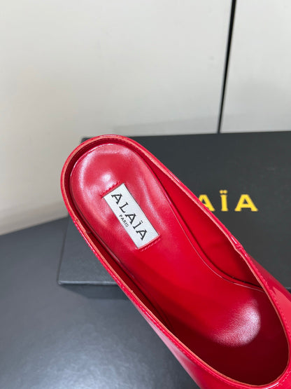 ALAIA WEDGE MULES 25S IN RED LAMBSKIN