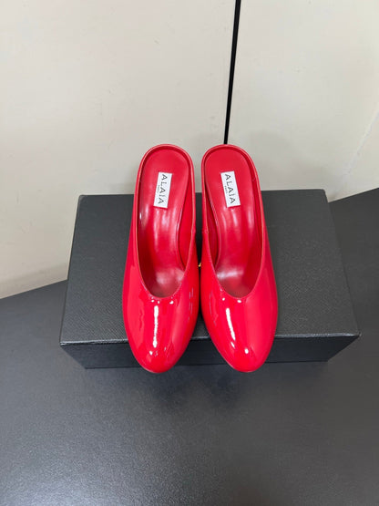 ALAIA WEDGE MULES 25S IN RED LAMBSKIN