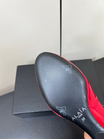 ALAIA WEDGE MULES 25S IN RED LAMBSKIN