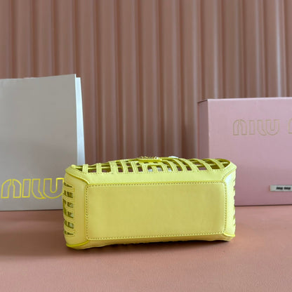 WOVEN HOLLOW BAG 24 IN LEMON YELLOW CALFSKIN