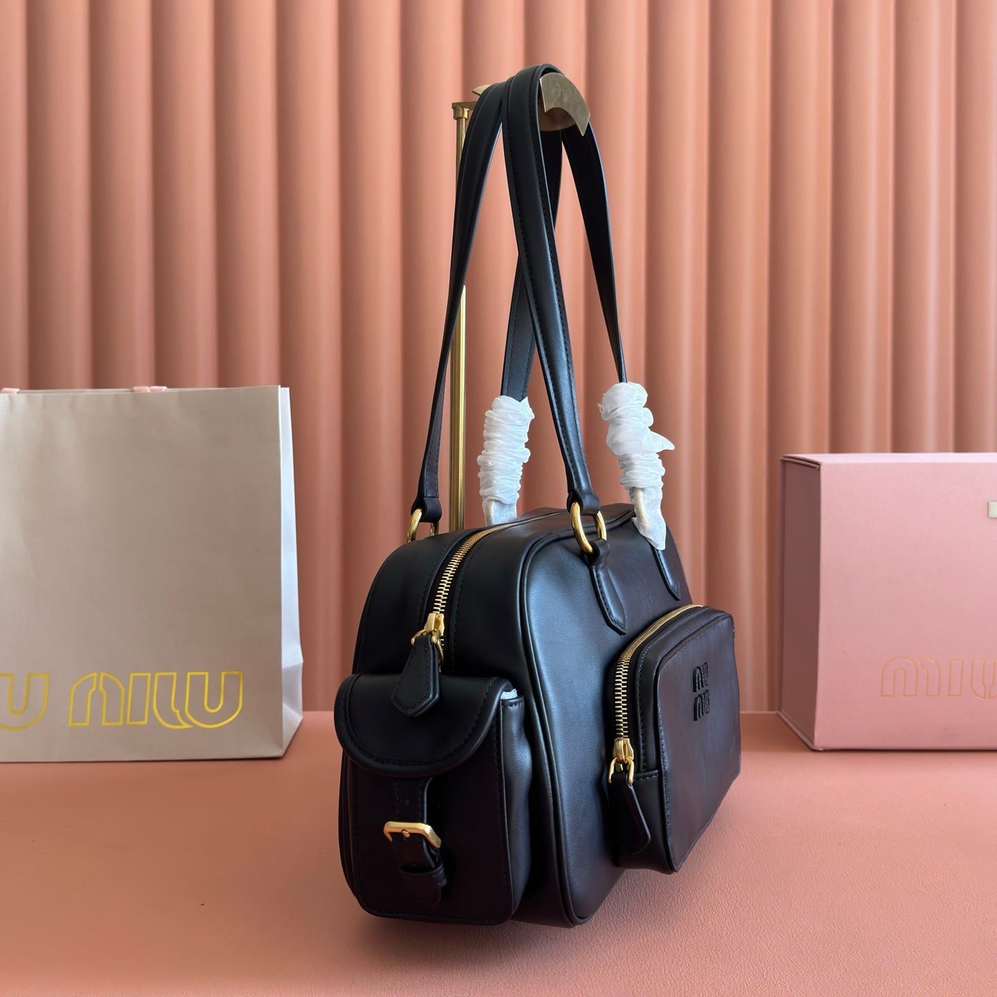 MIUMIU 26S POCKET TOP-HANDLE BAG 32 IN BLACK CALFSKIN GOLD HARDWARE