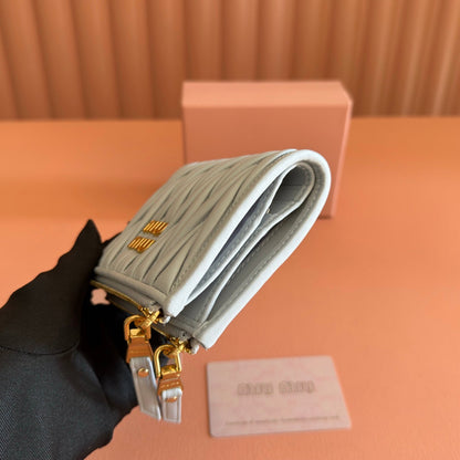 MIUMIU 26S SMALL MATELASSE CARD HOLDER 11 IN BLUE GRAY CALFSKIN GOLD HARDWARE