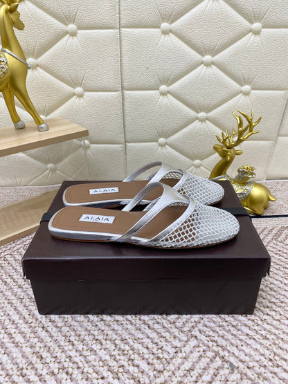 ALAIA BREATHABLE FLAT-TOE MULES 25S IN SILVER CALFSKIN