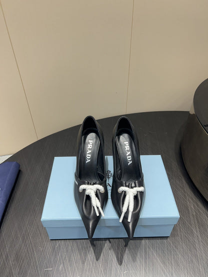 PRADA 25S POINTED TOE HIGH HEELS 85MM IN BLACK LAMBSKIN WITH TIE UP DESIGN
