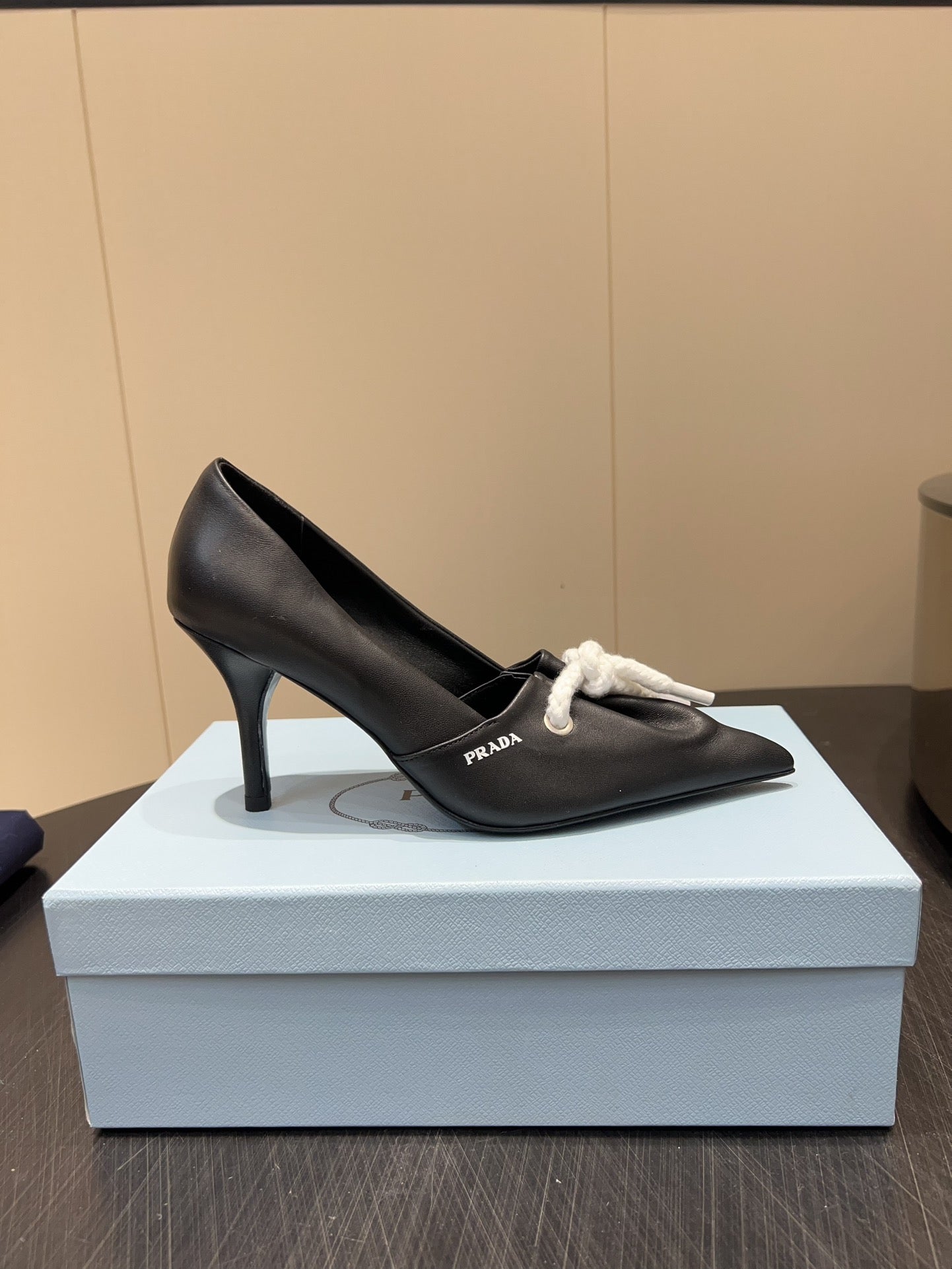 PRADA 25S POINTED TOE HIGH HEELS 85MM IN BLACK LAMBSKIN WITH TIE UP DESIGN