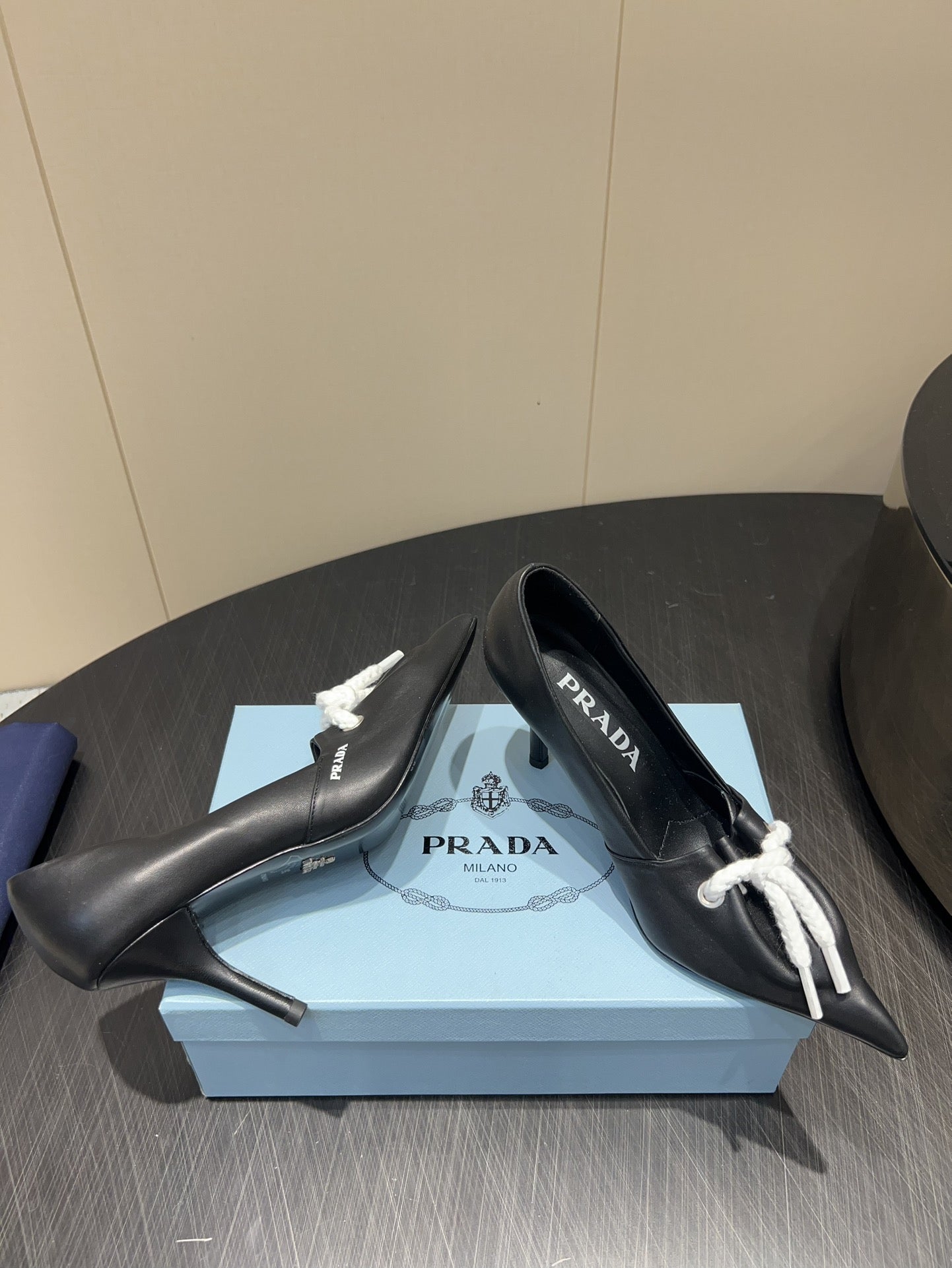 PRADA 25S POINTED TOE HIGH HEELS 85MM IN BLACK LAMBSKIN WITH TIE UP DESIGN