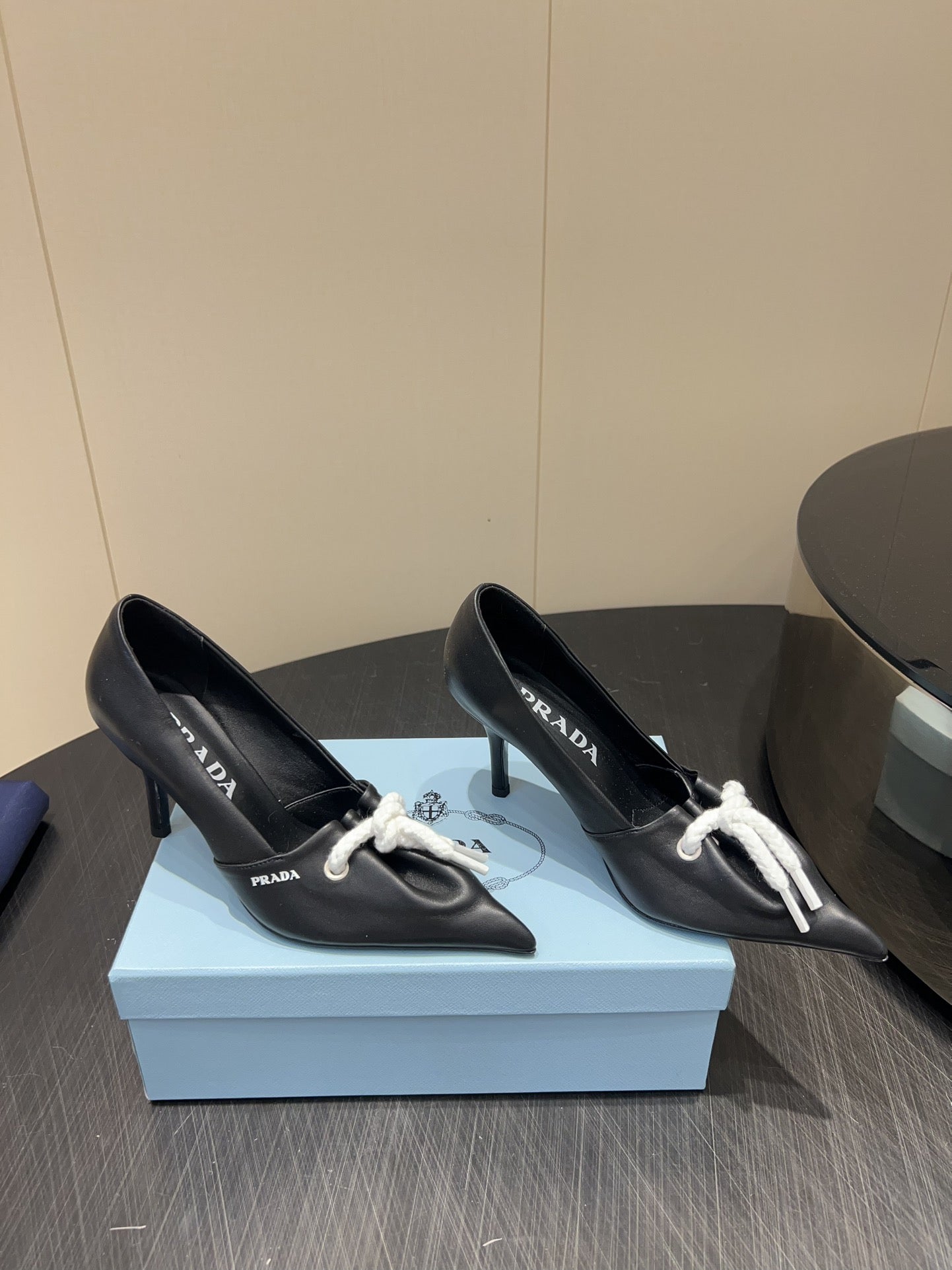 PRADA 25S POINTED TOE HIGH HEELS 85MM IN BLACK LAMBSKIN WITH TIE UP DESIGN