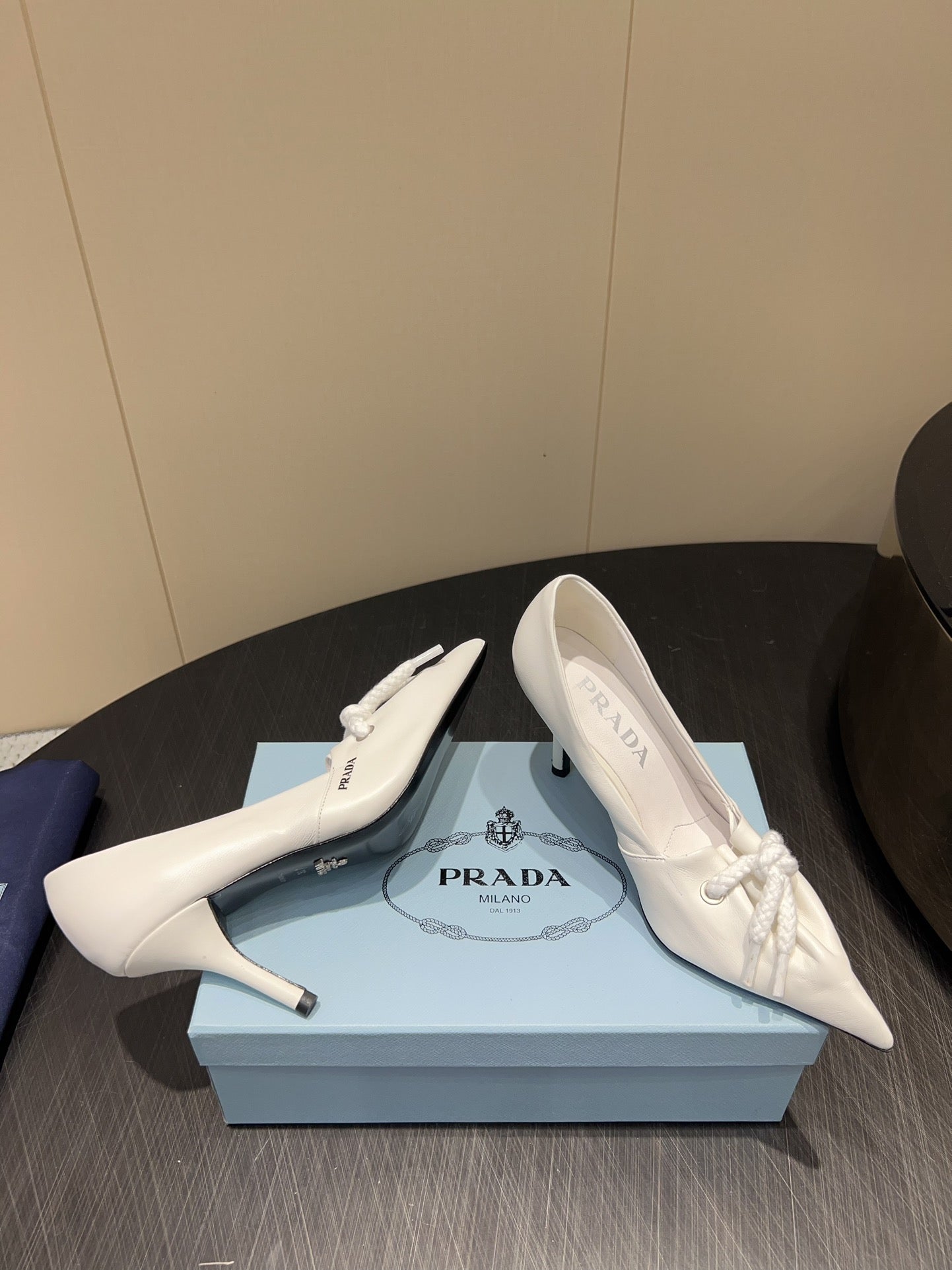 PRADA 25S POINTED TOE HIGH HEELS 85MM IN IVORY LAMBSKIN WITH TIE UP DESIGN