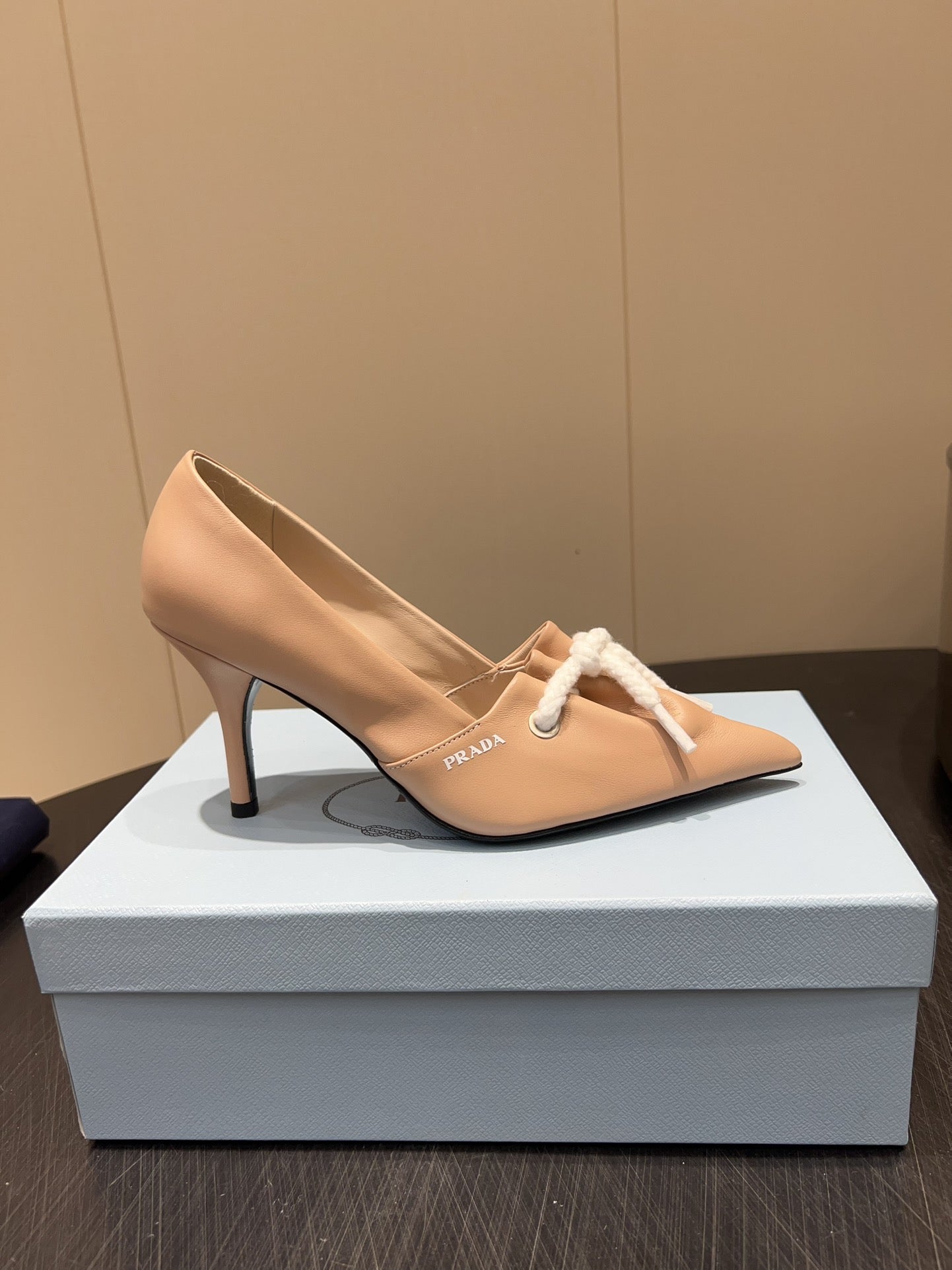 PRADA 25S POINTED TOE HIGH HEELS 85MM IN BEIGE LAMBSKIN WITH TIE UP DESIGN