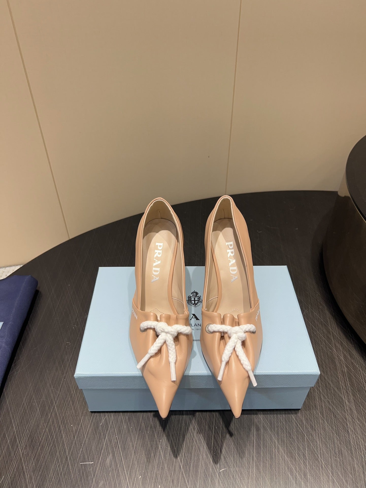 PRADA 25S POINTED TOE HIGH HEELS 85MM IN BEIGE LAMBSKIN WITH TIE UP DESIGN