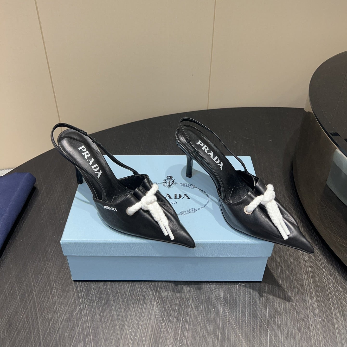 PRADA 25S POINTED TOE SLINGBACK 85MM IN BLACK LAMBSKIN WITH TIE UP DESIGN