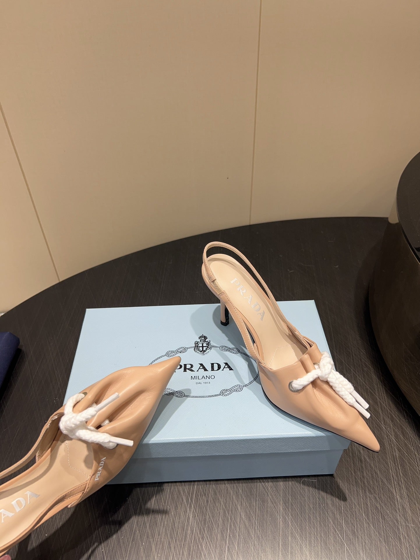 PRADA 25S POINTED TOE SLINGBACK 85MM IN BEIGE LAMBSKIN WITH TIE UP DESIGN