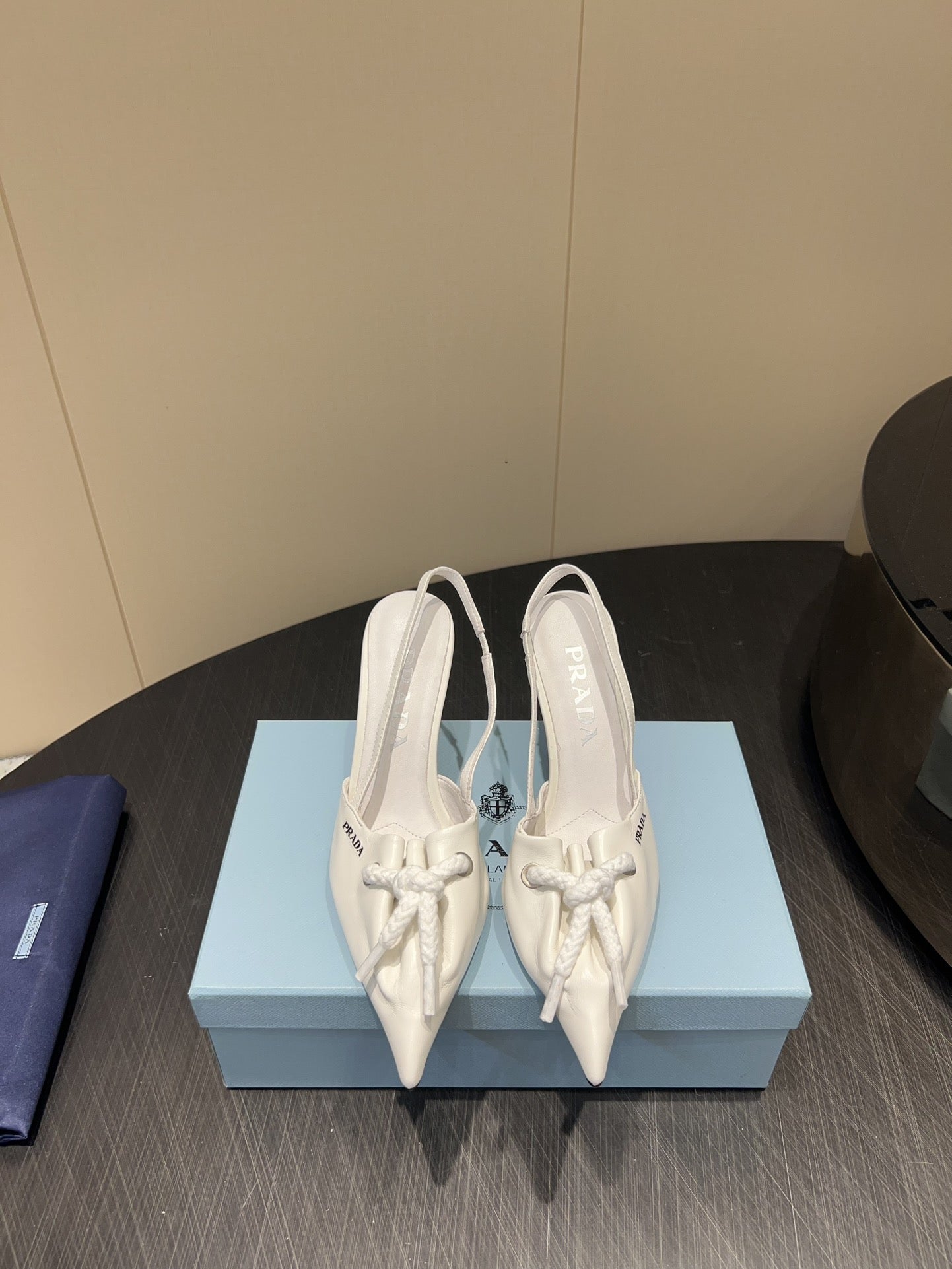 PRADA 25S POINTED TOE SLINGBACK 85MM IN WHITE LAMBSKIN WITH TIE UP DESIGN