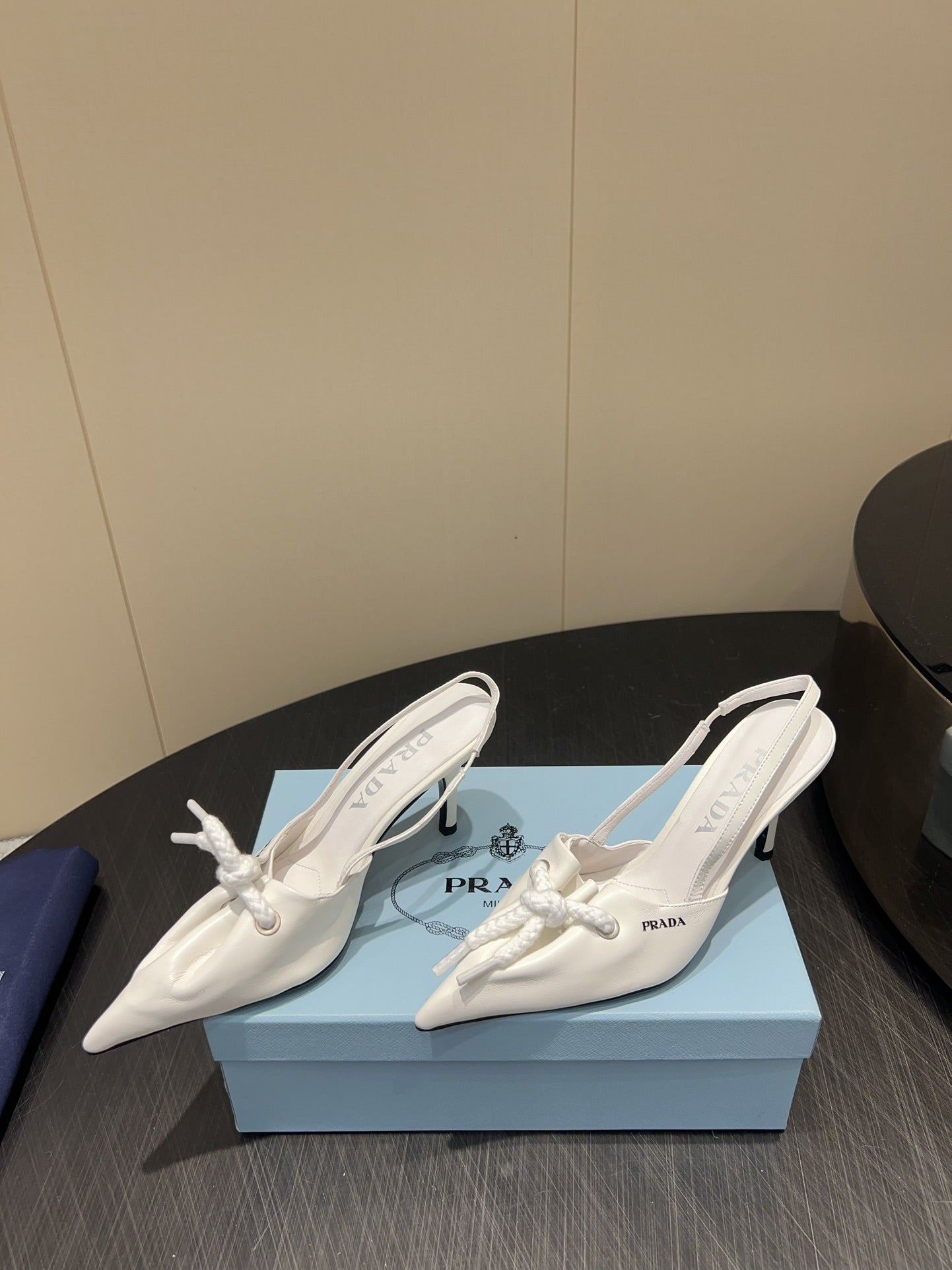 PRADA 25S POINTED TOE SLINGBACK 85MM IN WHITE LAMBSKIN WITH TIE UP DESIGN