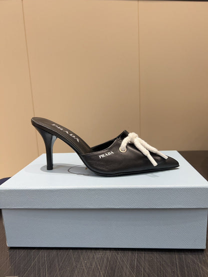 PRADA 25S BRAIDED DETAIL MULES 85MM IN BLACK CALFSKIN