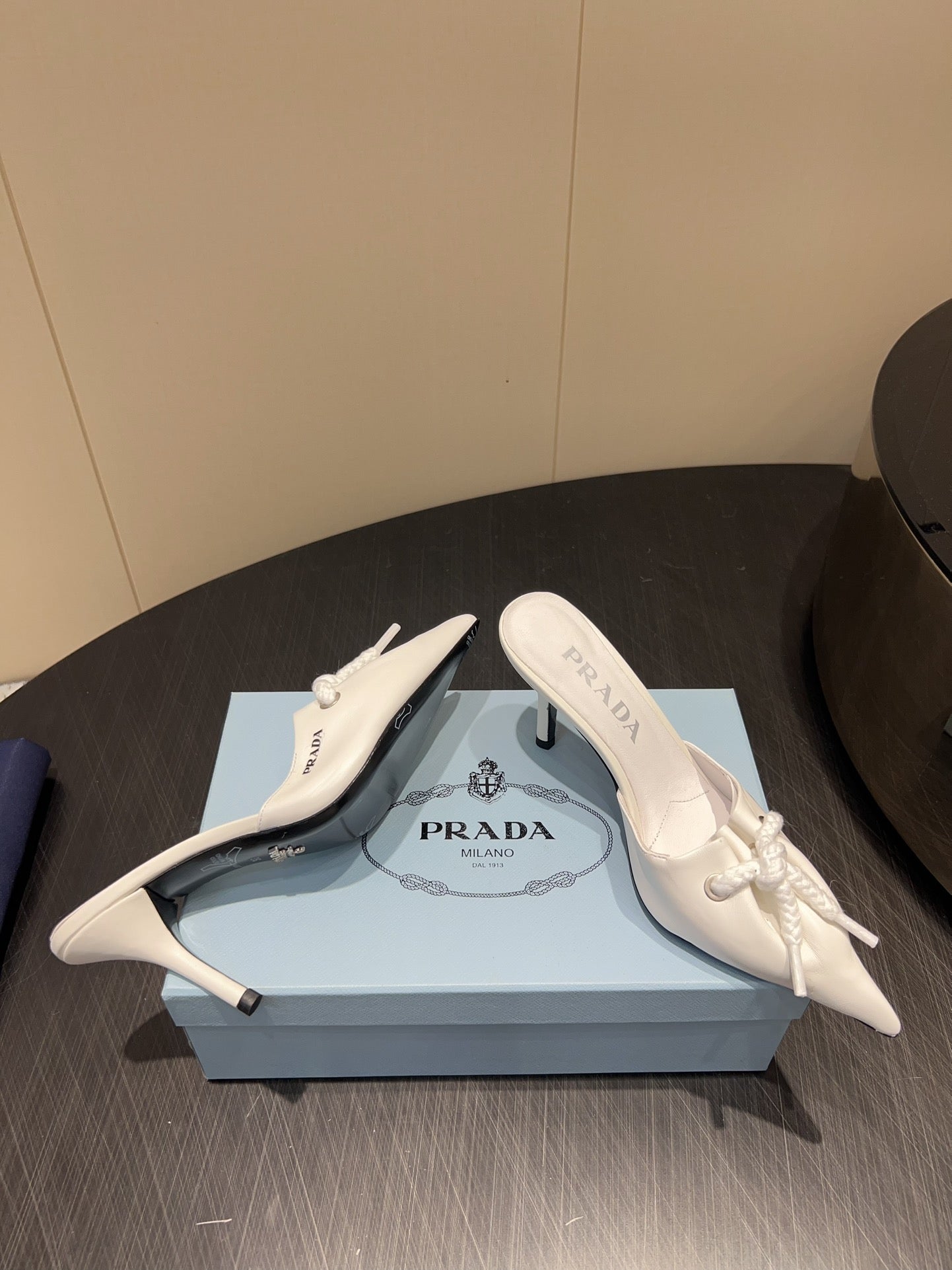 PRADA 25S BRAIDED DETAIL MULES 85MM IN WHITE CALFSKIN