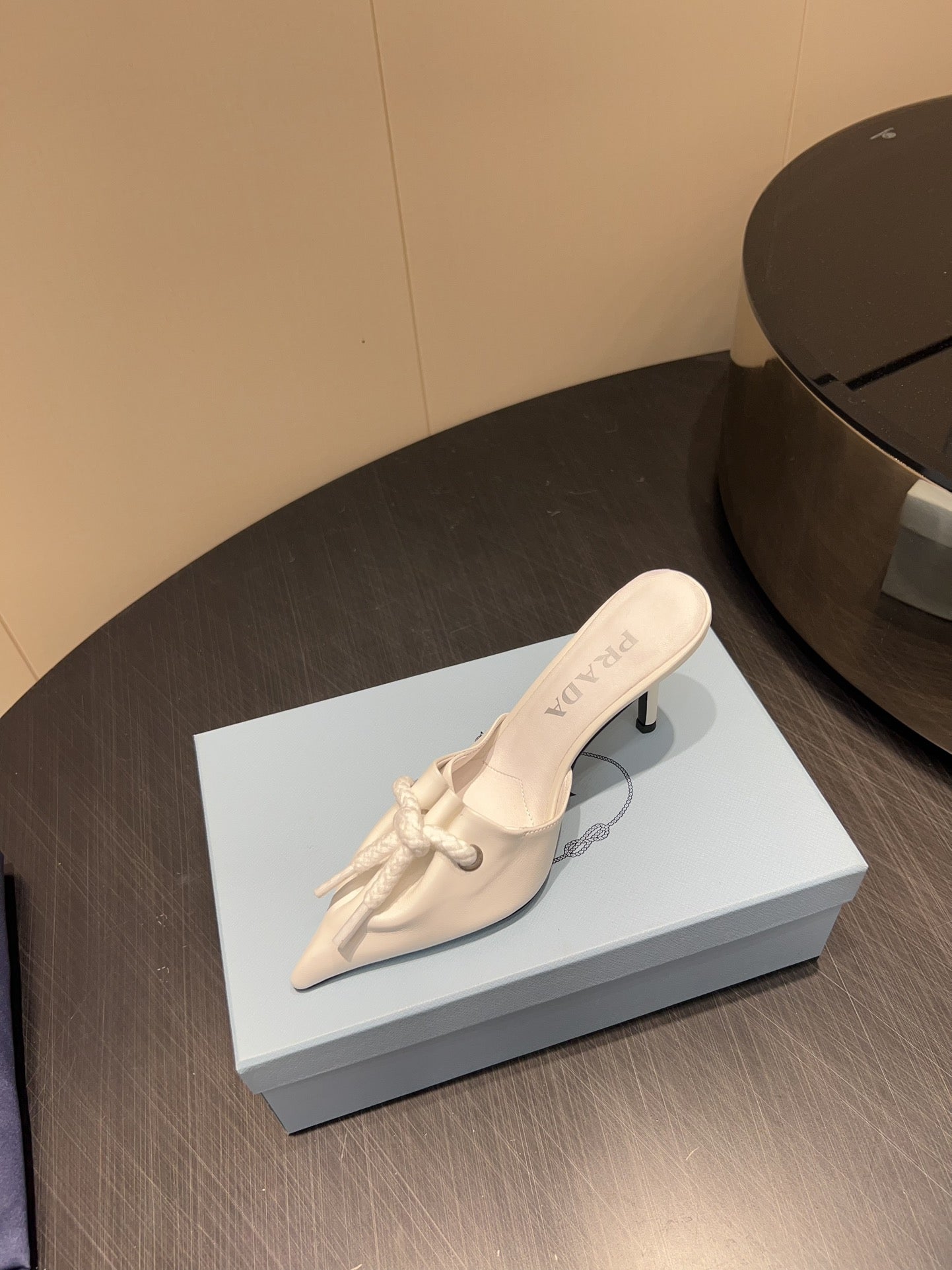 PRADA 25S BRAIDED DETAIL MULES 85MM IN WHITE CALFSKIN