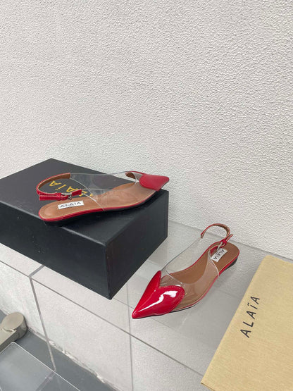 ALAIA LE COEUR FLAT SLINGBACKS IN CHERRY RED PATENT LAMBSKIN