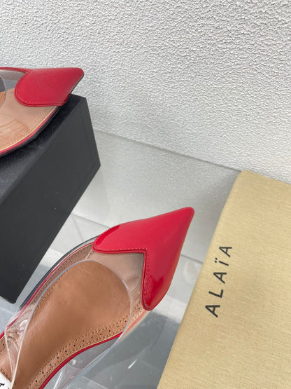 ALAIA LE COEUR FLAT SLINGBACKS IN CHERRY RED PATENT LAMBSKIN