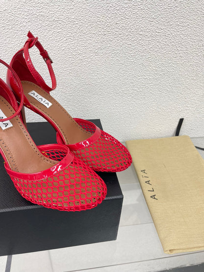 ALAIA HIGH FISHNET 9 CM PUMPS IN CHERRY RED MESH