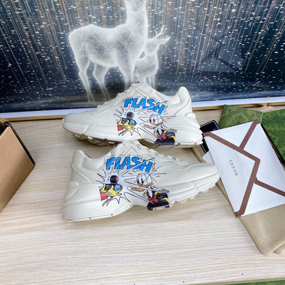 GG COUPLE TRAINER WHITE CALFSKIN WITH DONALD DUCK ICON