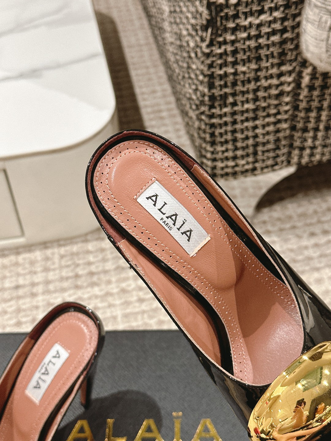 ALAIA SPIKE JEWEL MULES IN BLACK GLOSSY CALFSKIN WITH GOLD HARDWARE