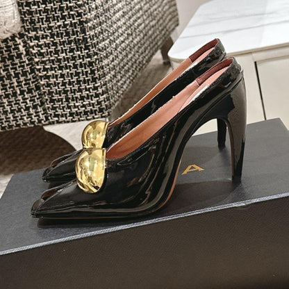 ALAIA SPIKE JEWEL MULES IN BLACK GLOSSY CALFSKIN WITH GOLD HARDWARE