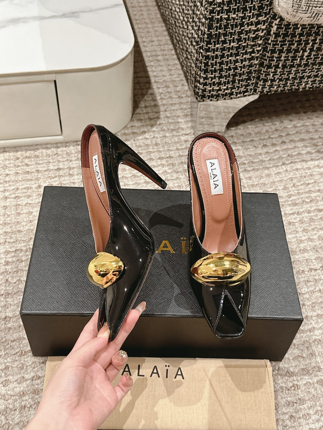ALAIA SPIKE JEWEL MULES IN BLACK GLOSSY CALFSKIN WITH GOLD HARDWARE