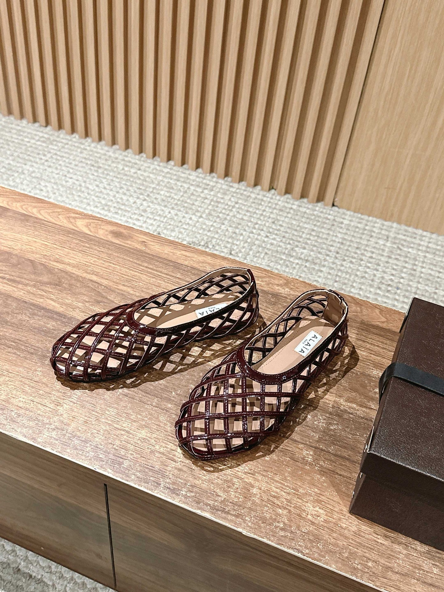 ALAIA MESH BALLET FLATS 25S IN DARK RED LAMBSKIN