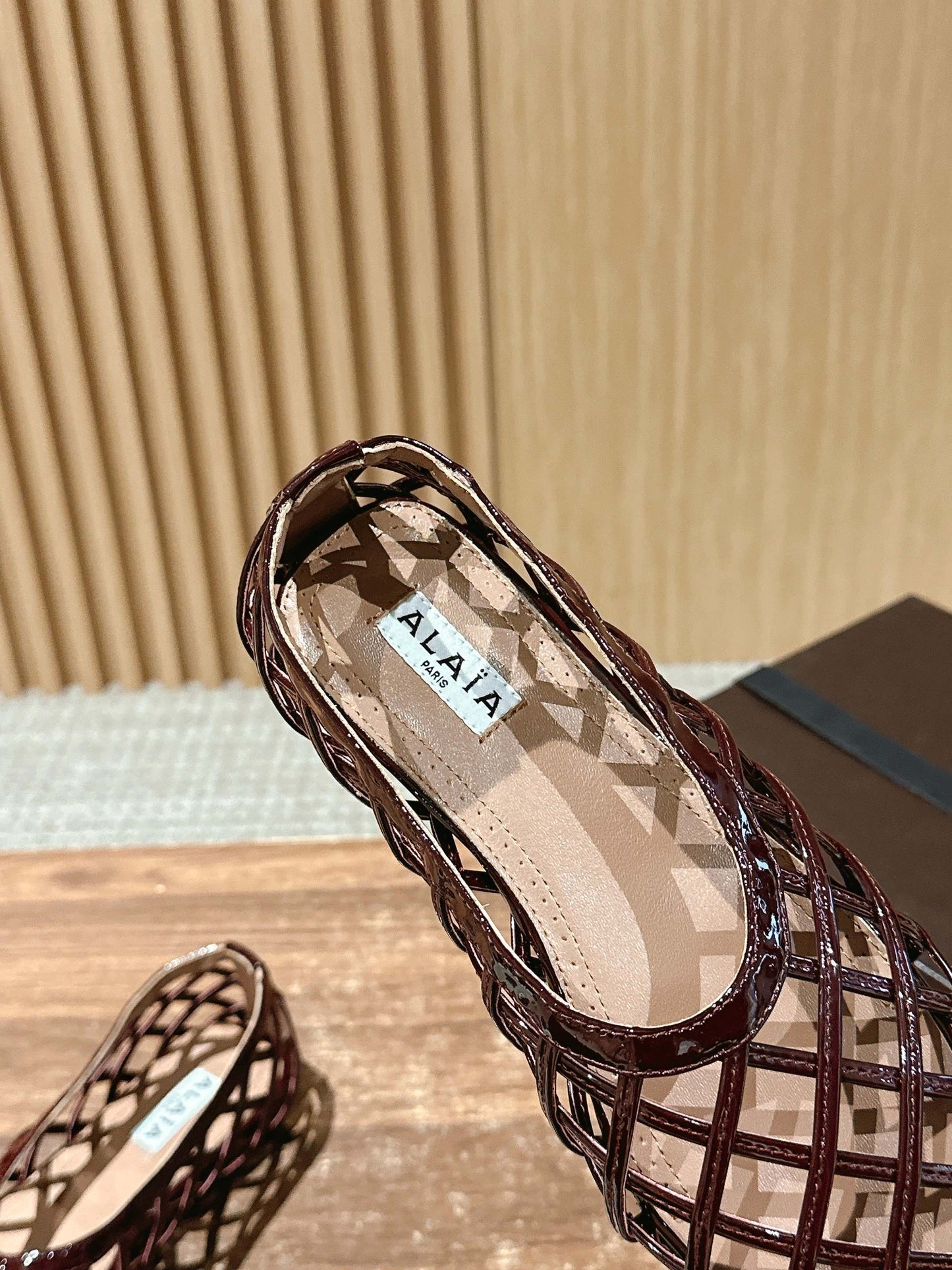 ALAIA MESH BALLET FLATS 25S IN DARK RED LAMBSKIN